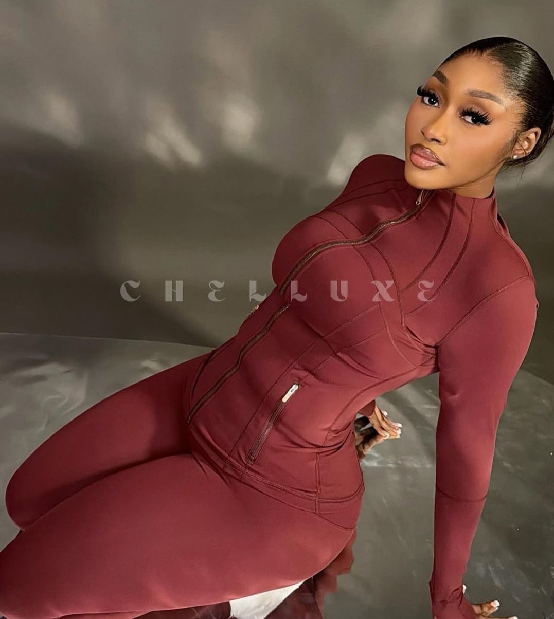 Chelluxe model in cherry wine athleisure set